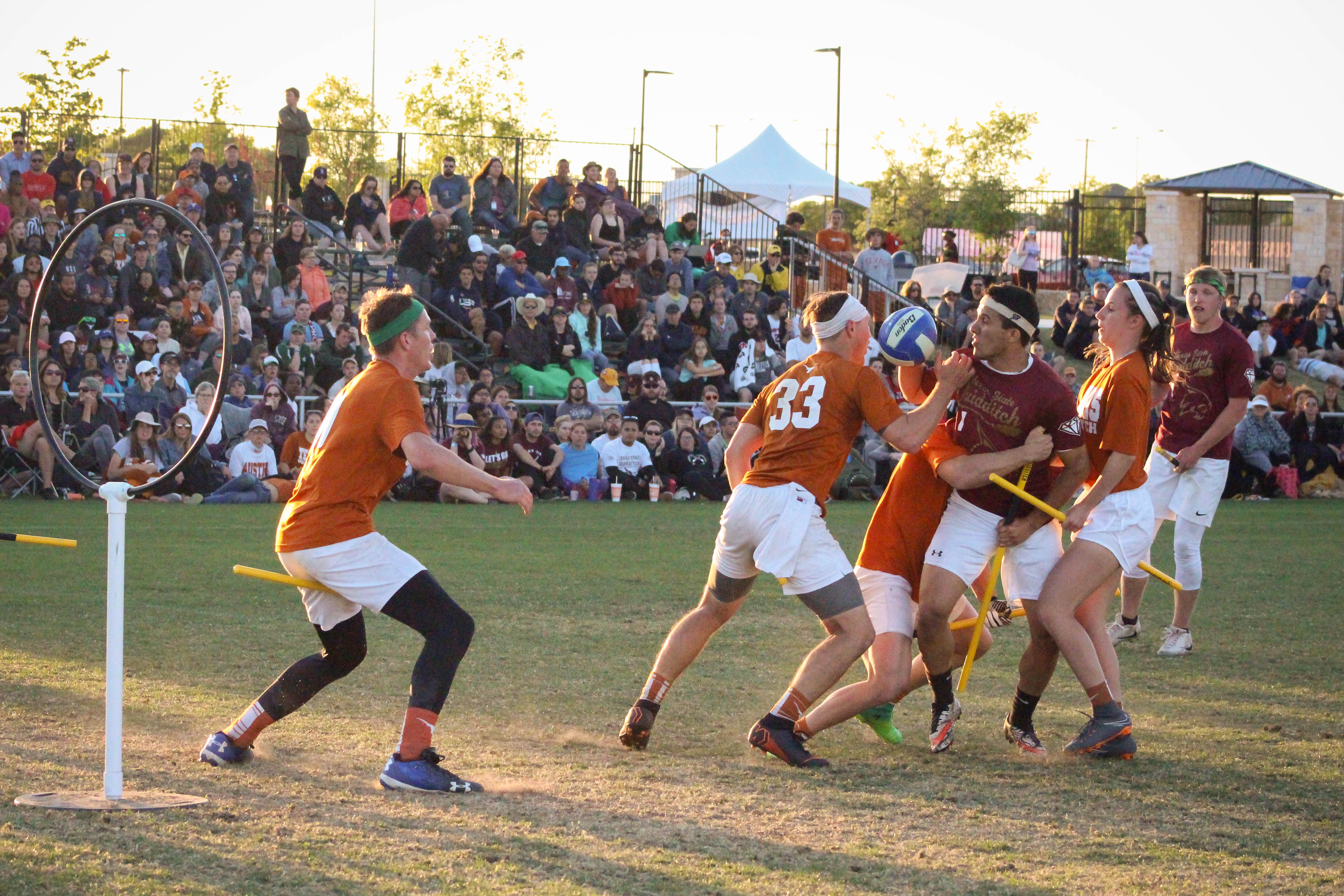 Players on field during a quidditch tournament