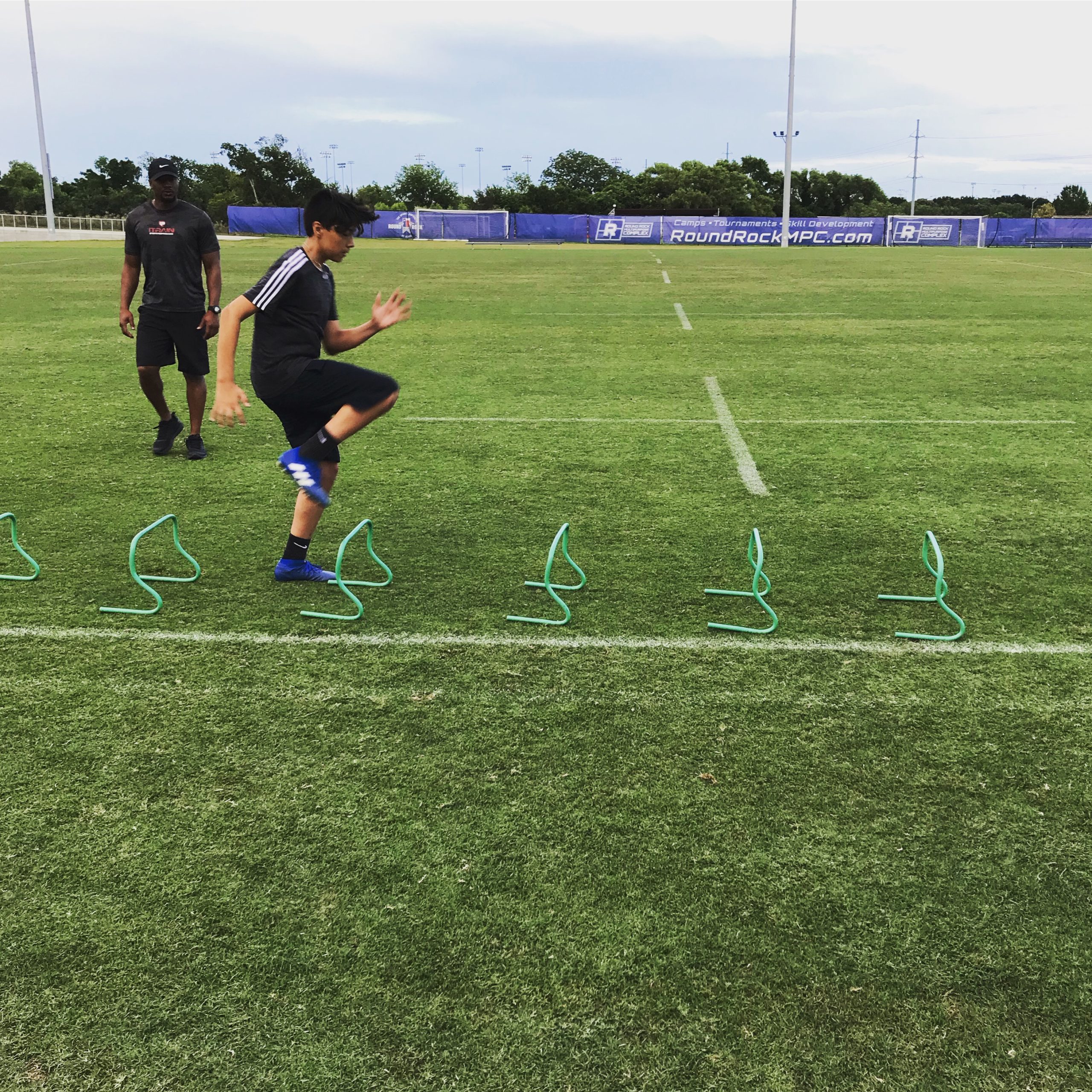athlete running foot trainers for skill training